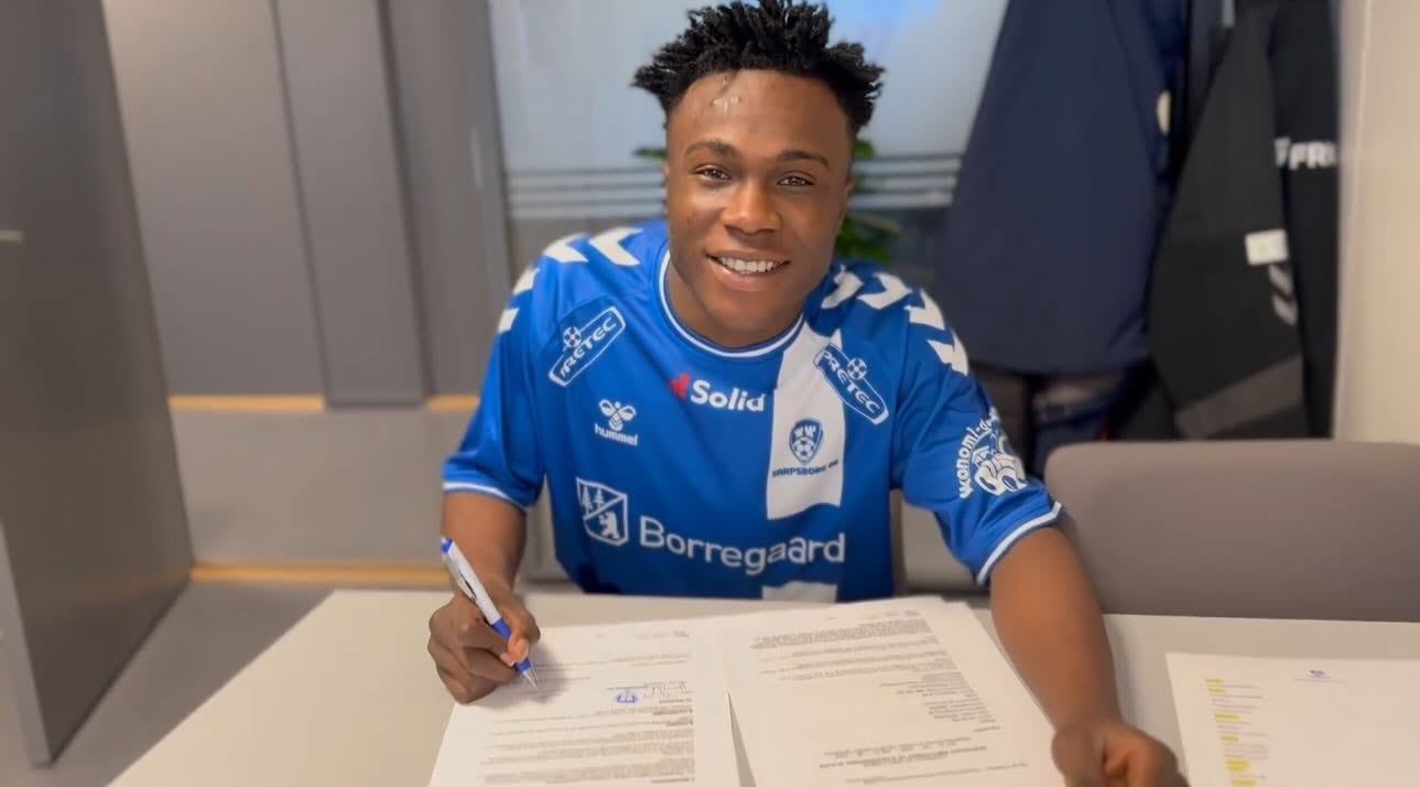Footballer signing a professional contract